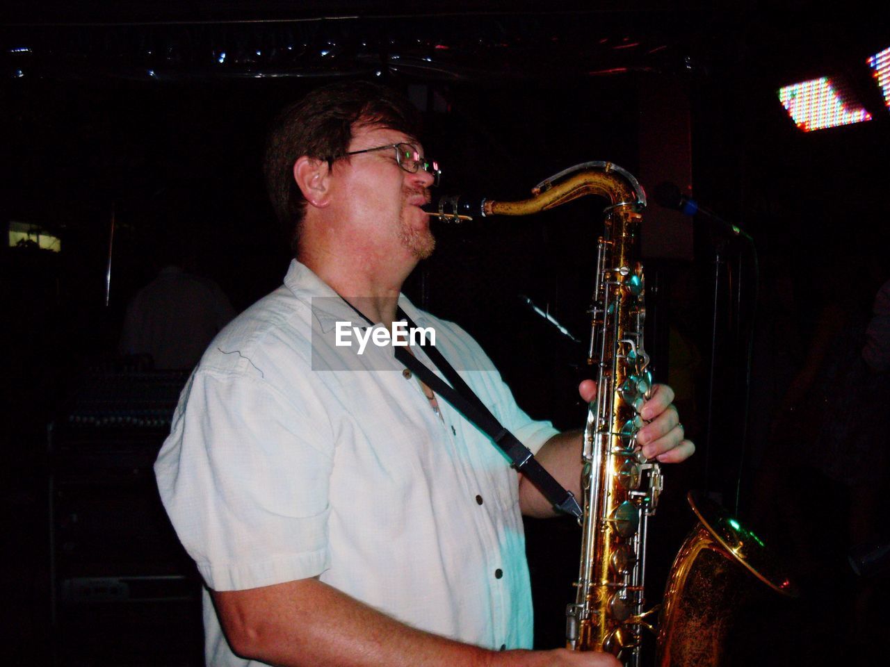 MAN PLAYING PIANO