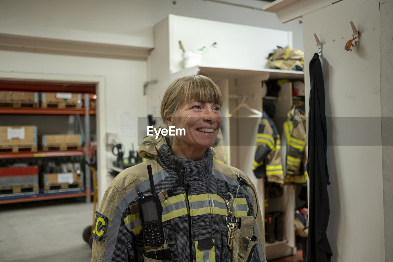 Smiling female firefighter