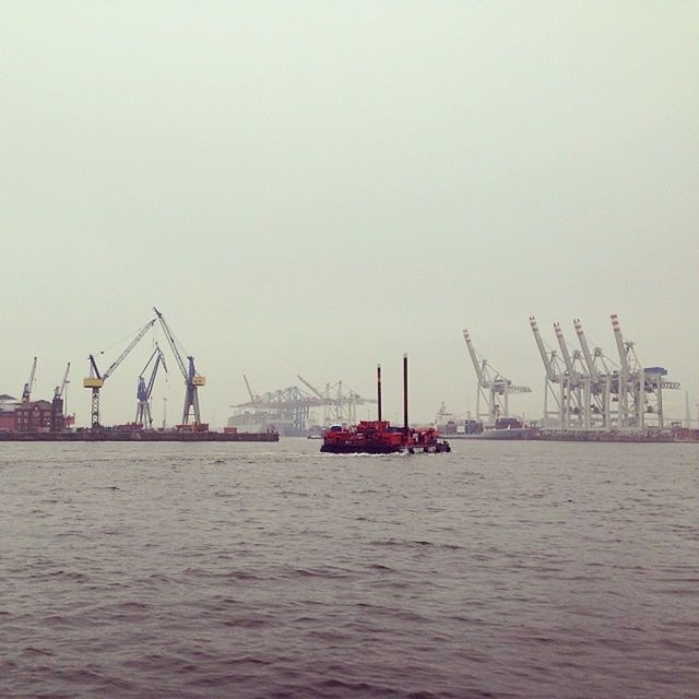 SHIP MOORED AT HARBOR