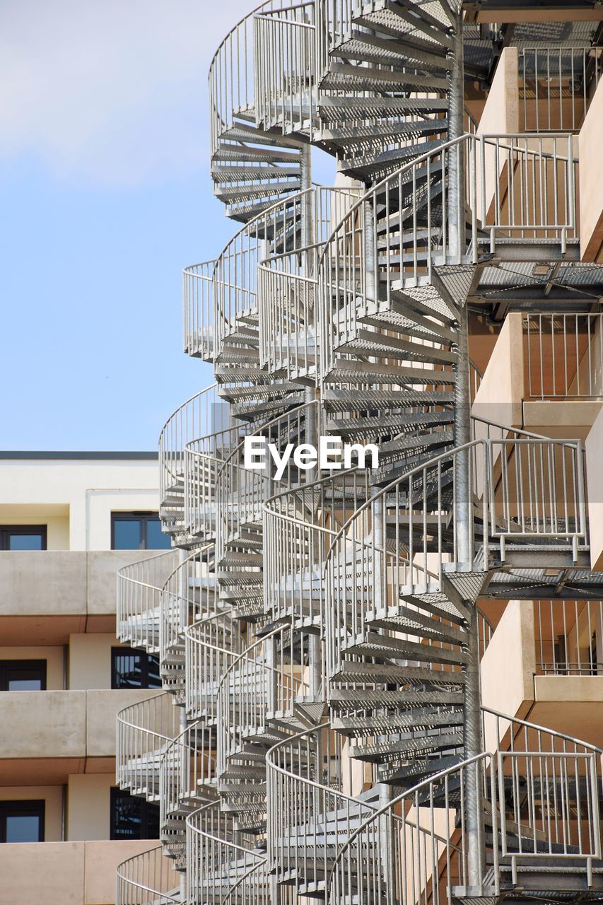 Low angle view of spiral staircase of building