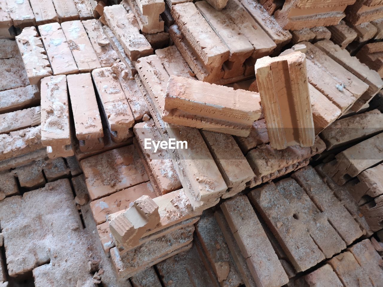 HIGH ANGLE VIEW OF STACK OF CONSTRUCTION SITE