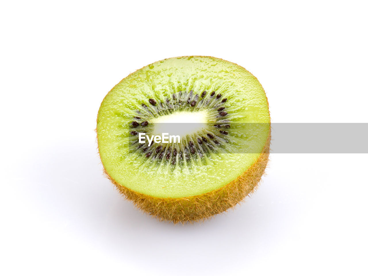 CLOSE-UP OF BANANA AGAINST WHITE BACKGROUND