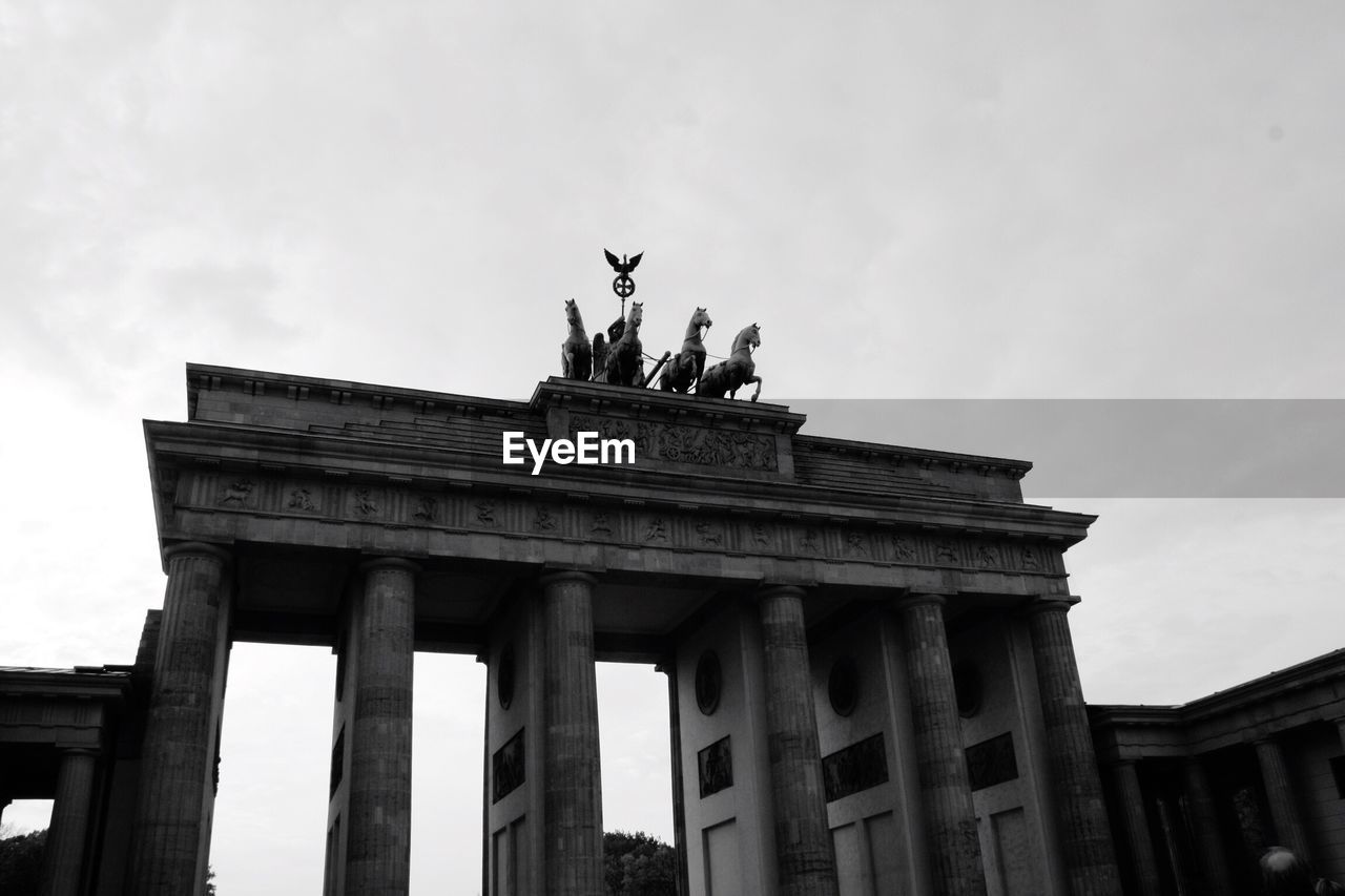 Low angle view of brandenburg gate against sky