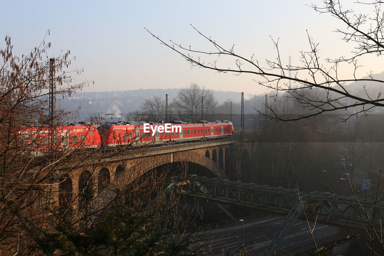 Train on railroad track against sky