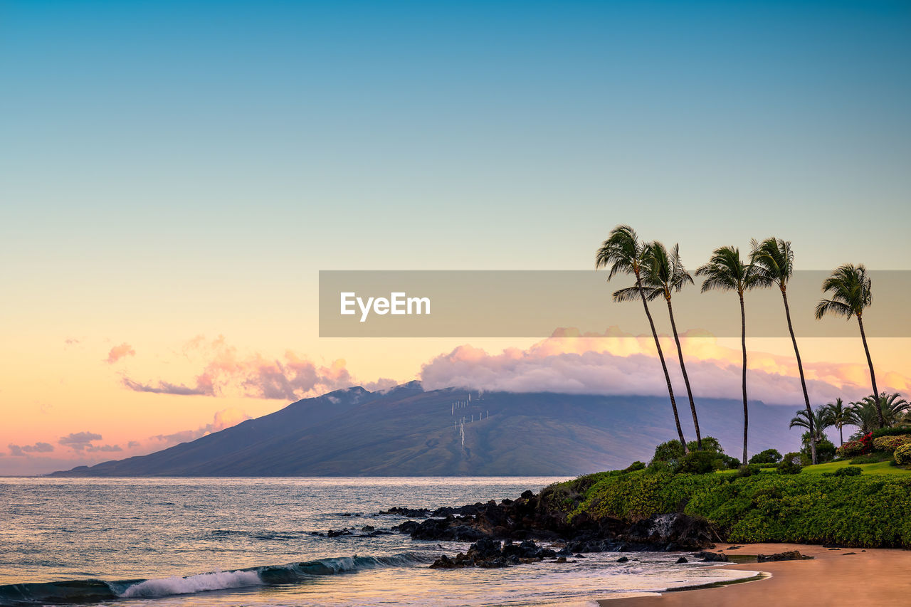 Scenic view of sea against sky during sunset