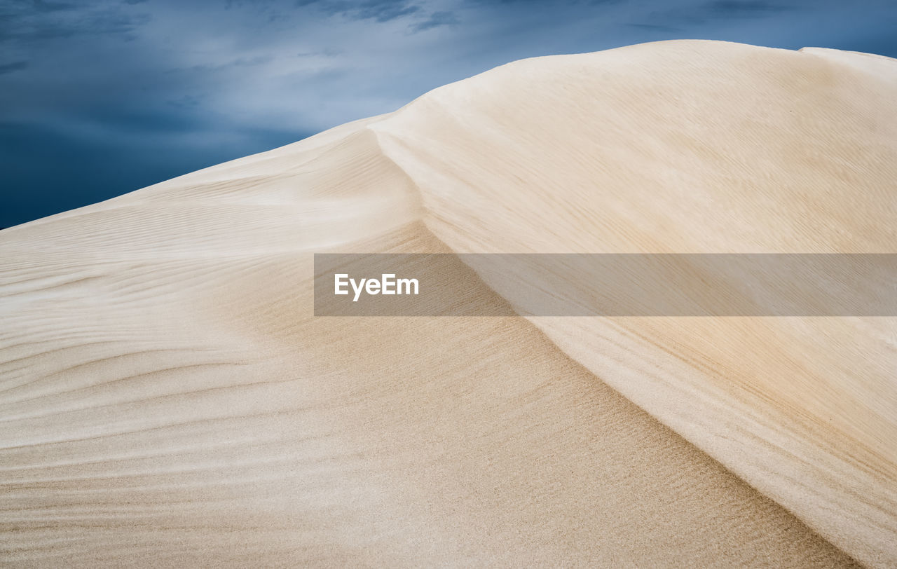 SAND DUNES IN DESERT