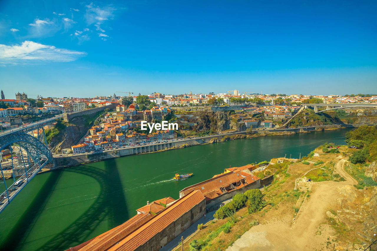 High angle view of river amidst buildings in city