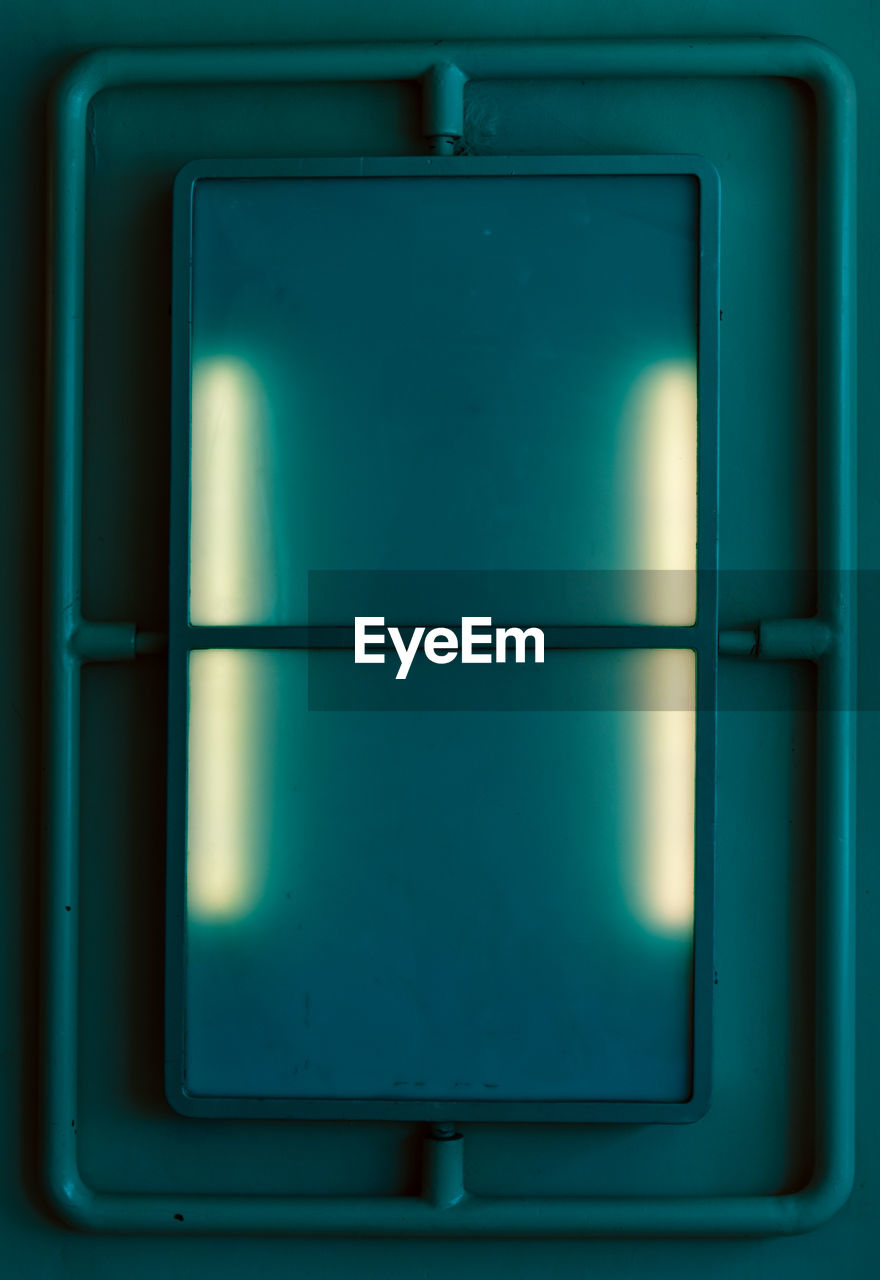 FULL FRAME SHOT OF BLUE METAL WINDOW