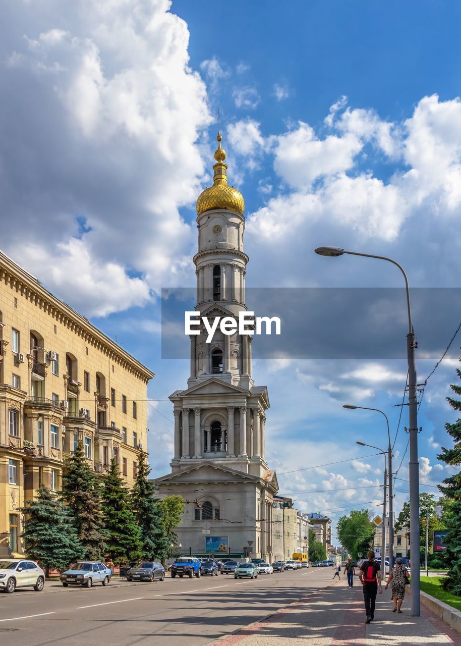 VIEW OF STREET AND BUILDINGS IN CITY