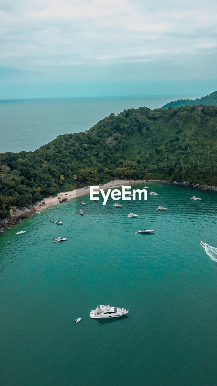 Scenic view of sea and bay against sky