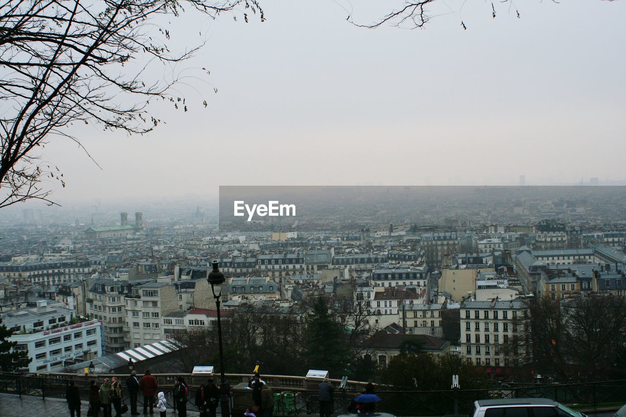 VIEW OF CITYSCAPE AGAINST SKY