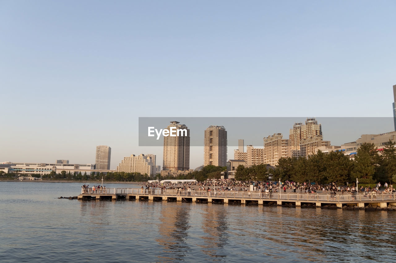 VIEW OF CITYSCAPE WITH WATERFRONT