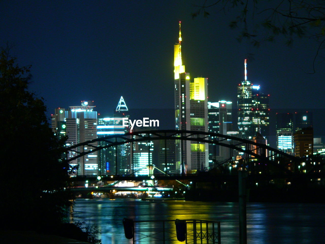 illuminated, night, architecture, built structure, building exterior, skyscraper, water, city, river, waterfront, no people, modern, travel destinations, outdoors, clear sky, sky