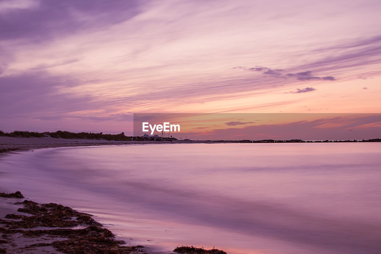 SCENIC VIEW OF SEA AGAINST ROMANTIC SKY