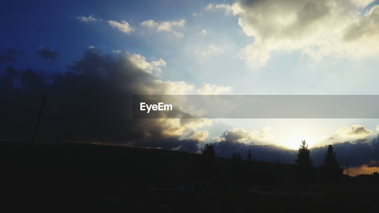 SCENIC VIEW OF SILHOUETTE LANDSCAPE AGAINST SKY