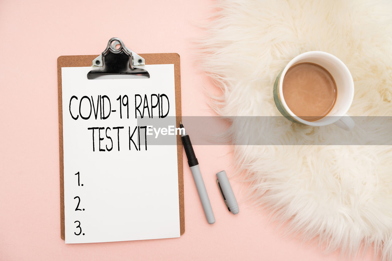 mug, text, cup, indoors, coffee, tableware, coffee cup, no people, drink, food and drink, pen, studio shot, skin, communication, paper, table, brown