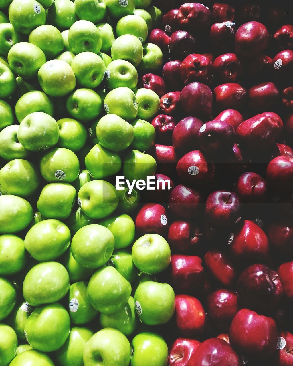 High angle view of various fresh apples at shop