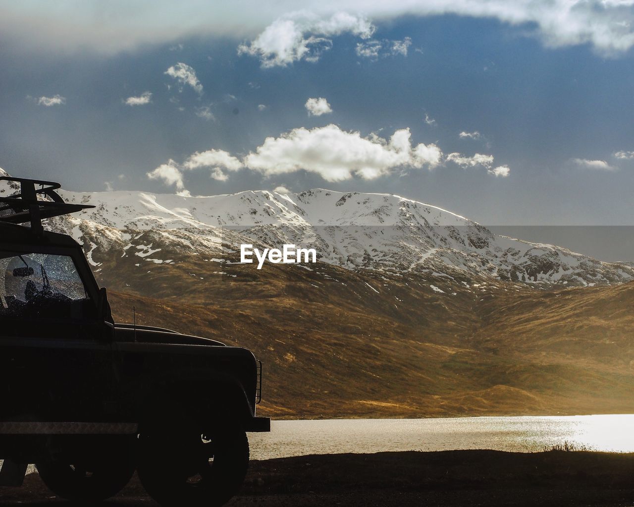 Scenic view of mountains against sky during winter