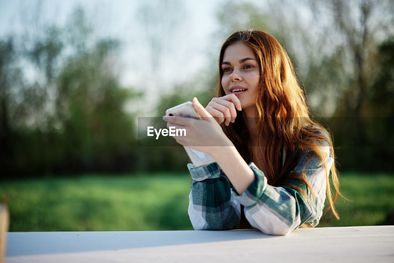 young woman using phone