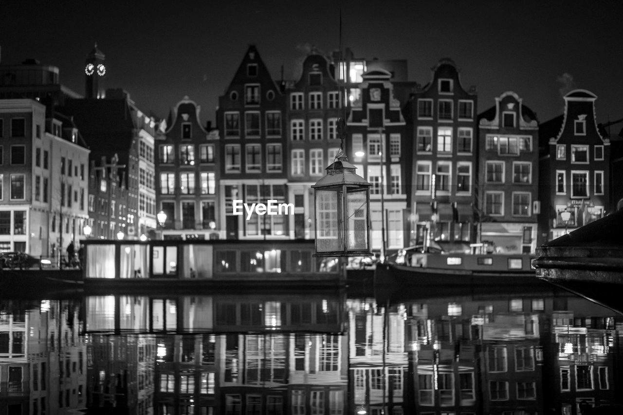 Buildings in city at night