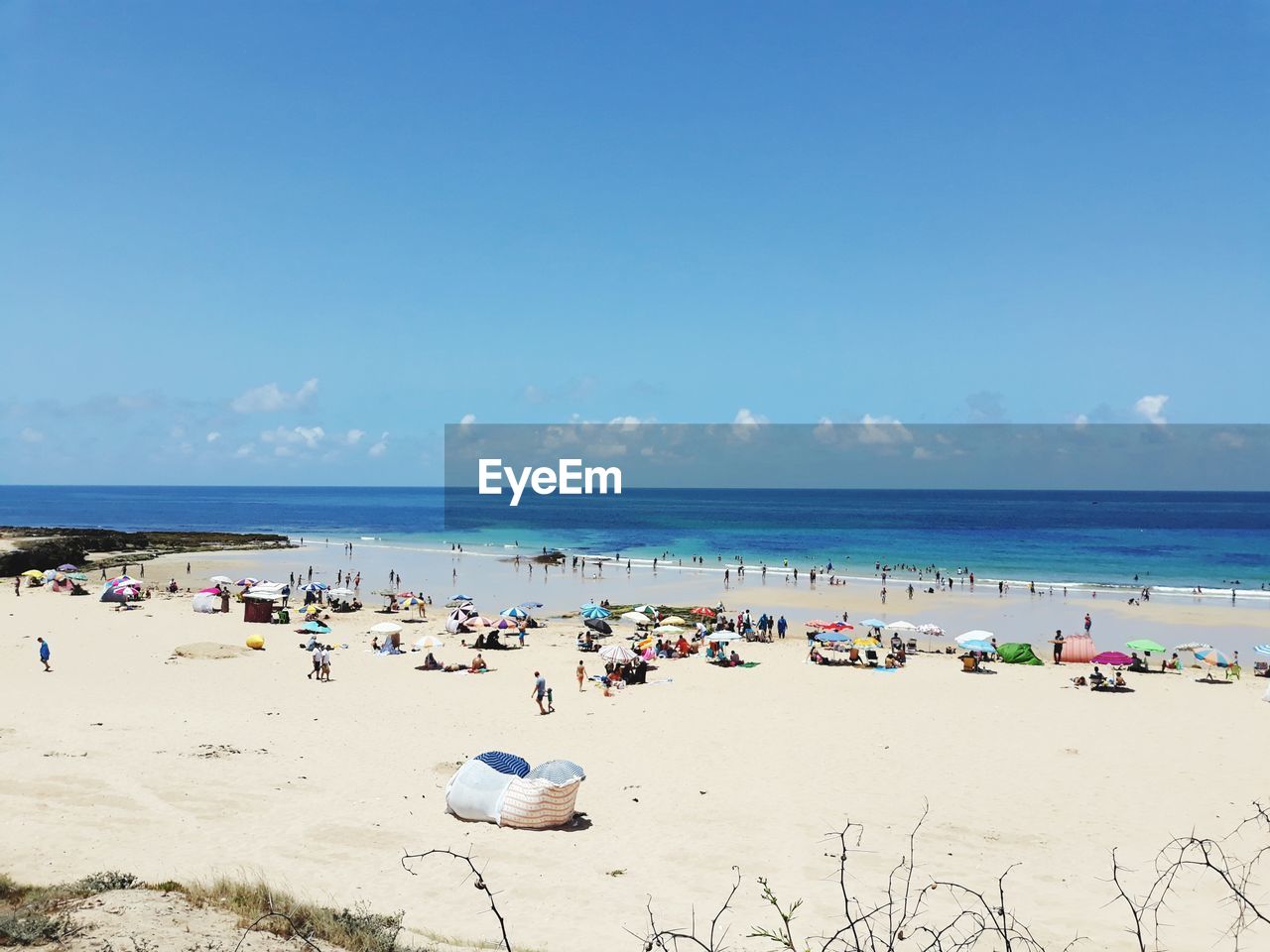 GROUP OF PEOPLE ON BEACH