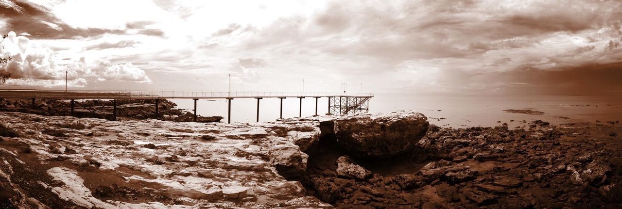 VIEW OF SEA AGAINST CLOUDY SKY