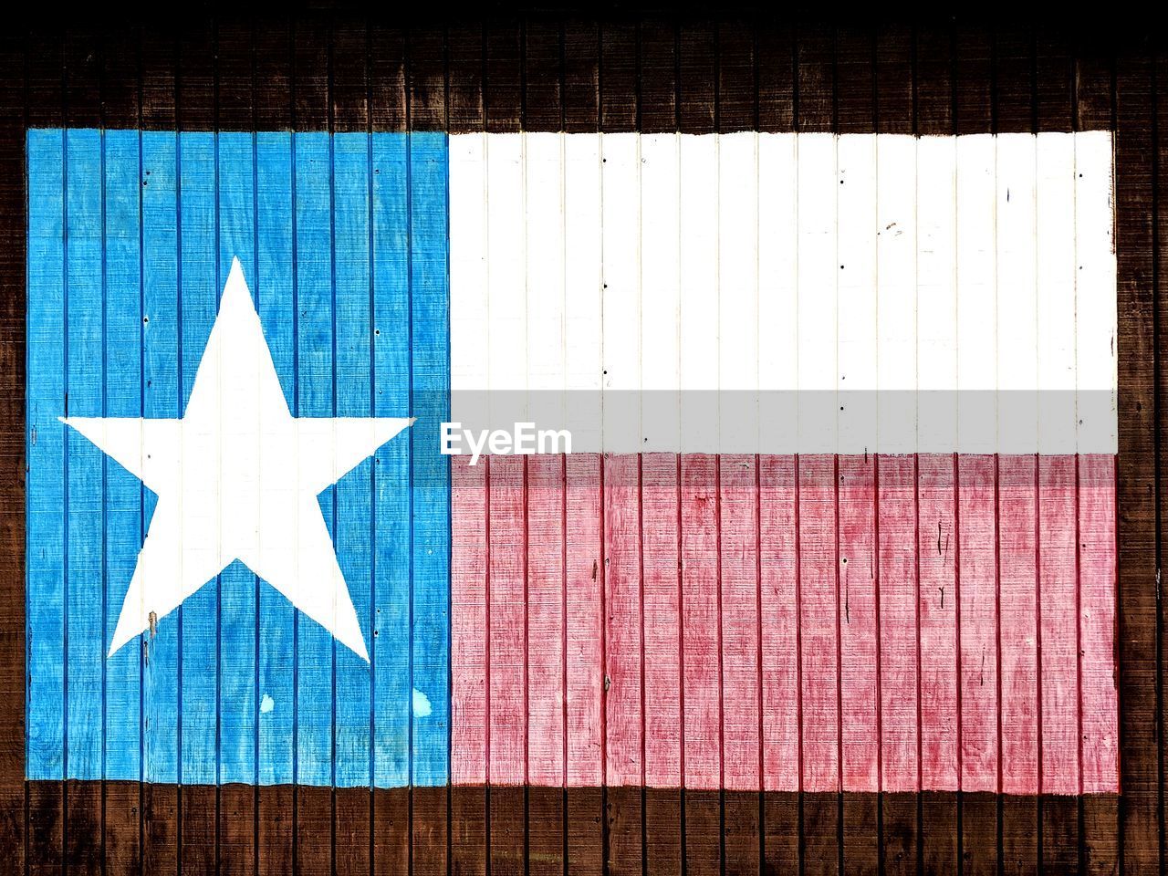 Full frame shot of texan flag on wood
