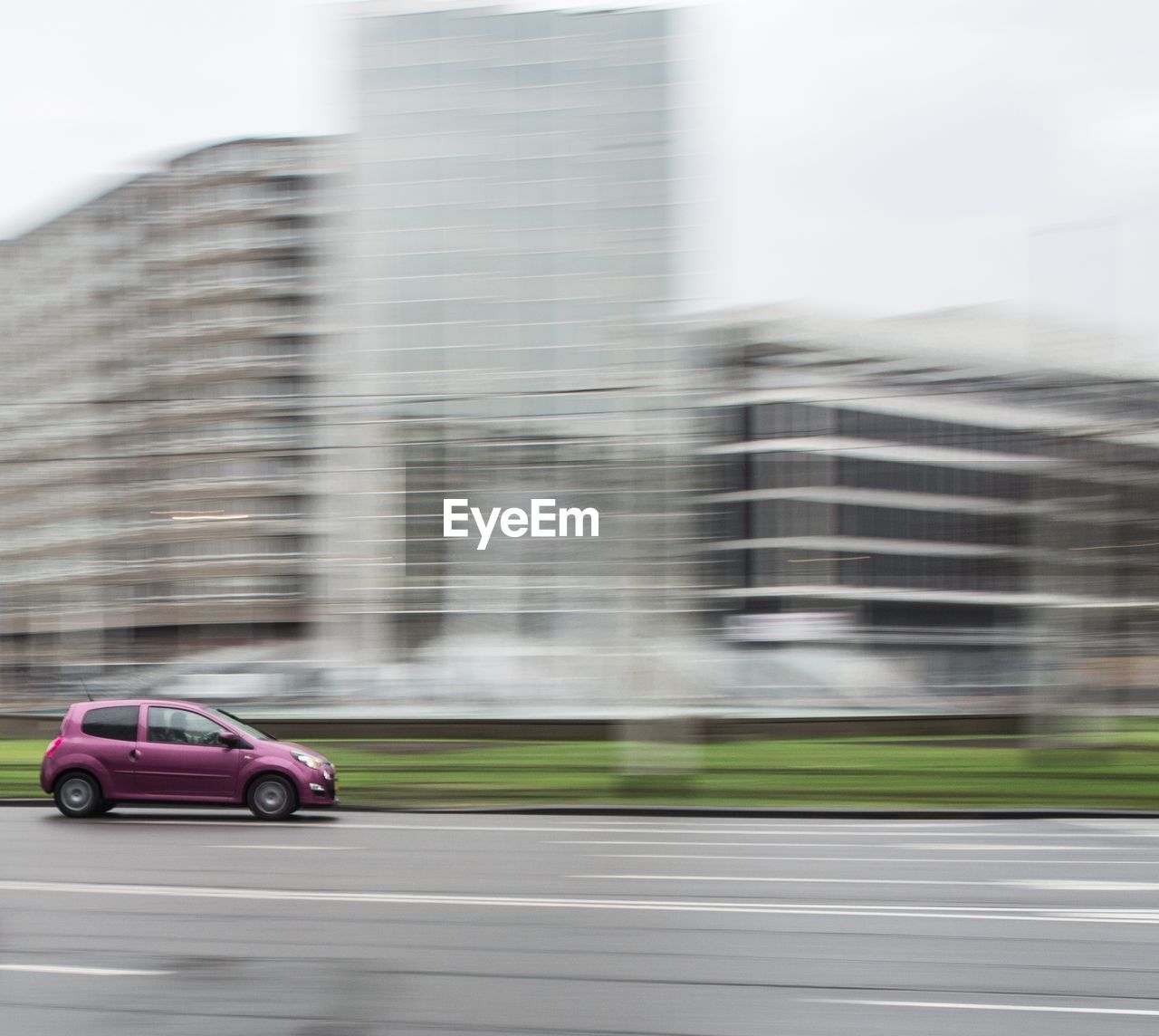 Blurred motion of car on road