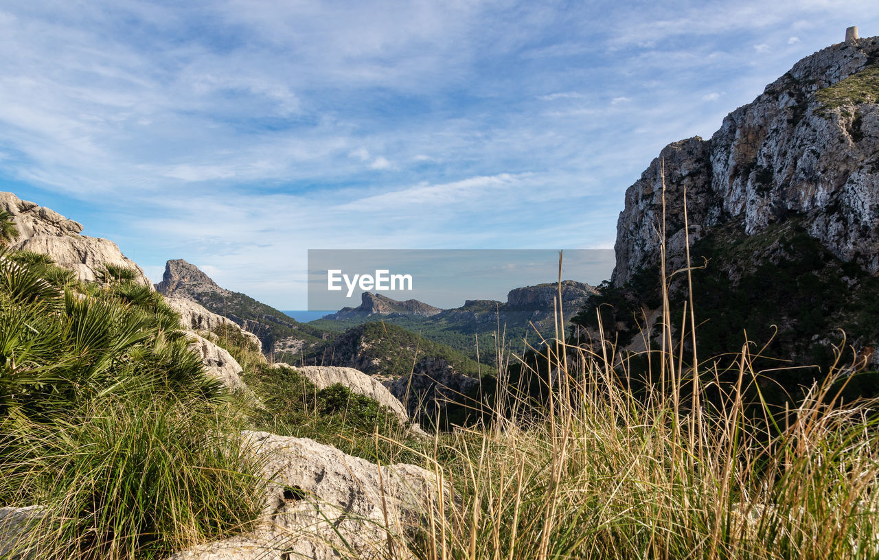 Scenic view of mountains against sky