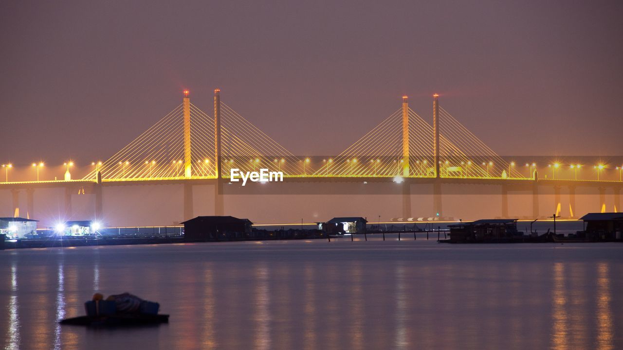 View of suspension bridge at night