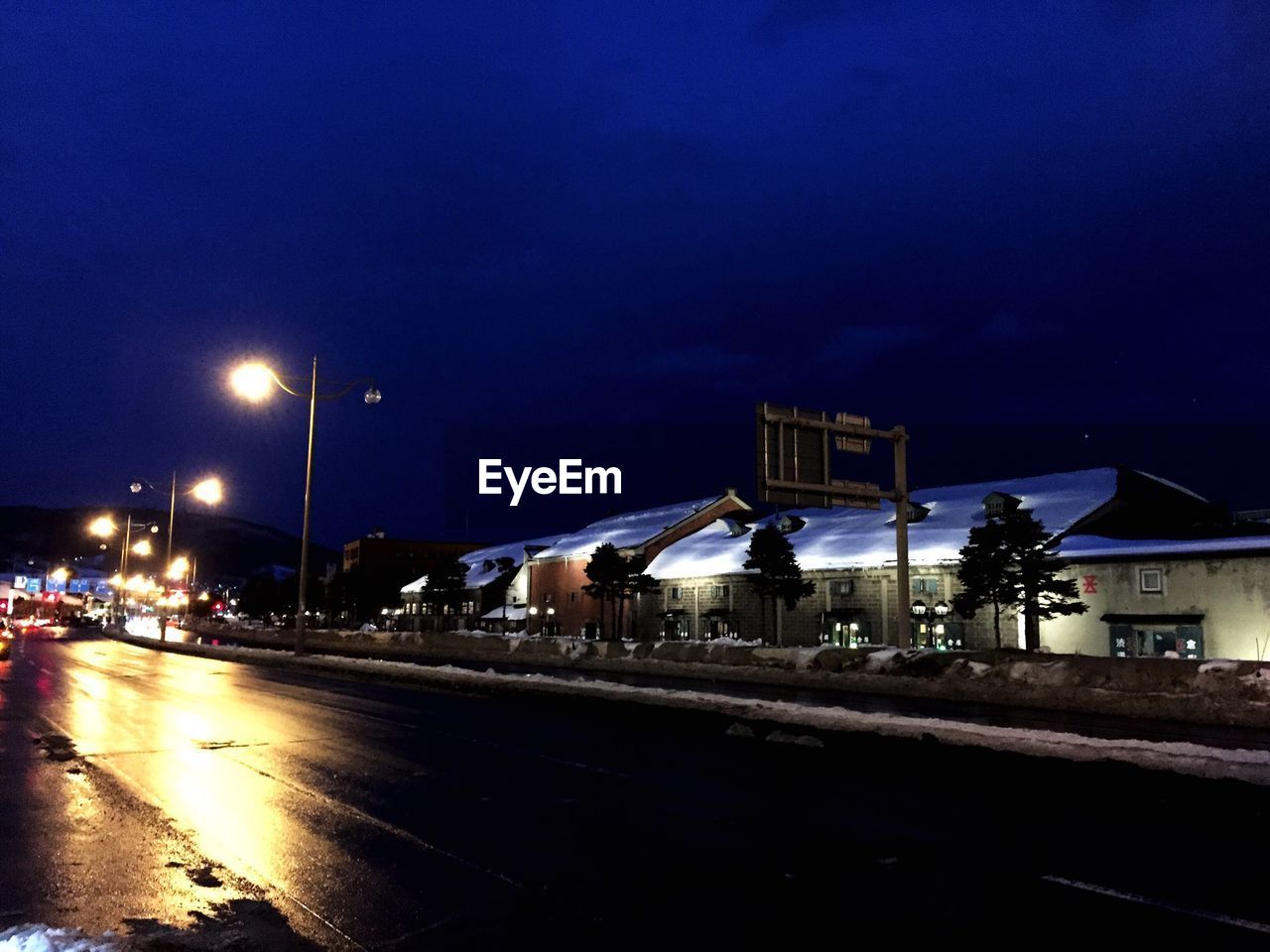 VIEW OF ROAD AT NIGHT