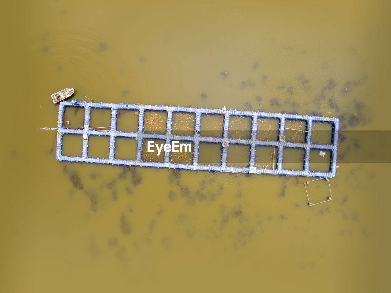 Aerial view of traditional fishing cage in river
