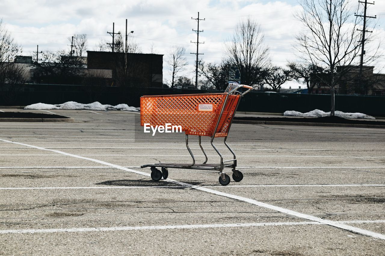 Abandoned shopping cart at parking lot