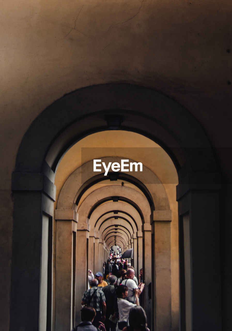 PEOPLE IN FRONT OF BUILDING