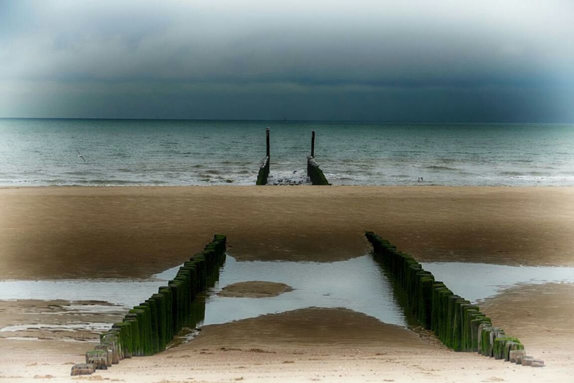 VIEW OF PIER OVER SEA