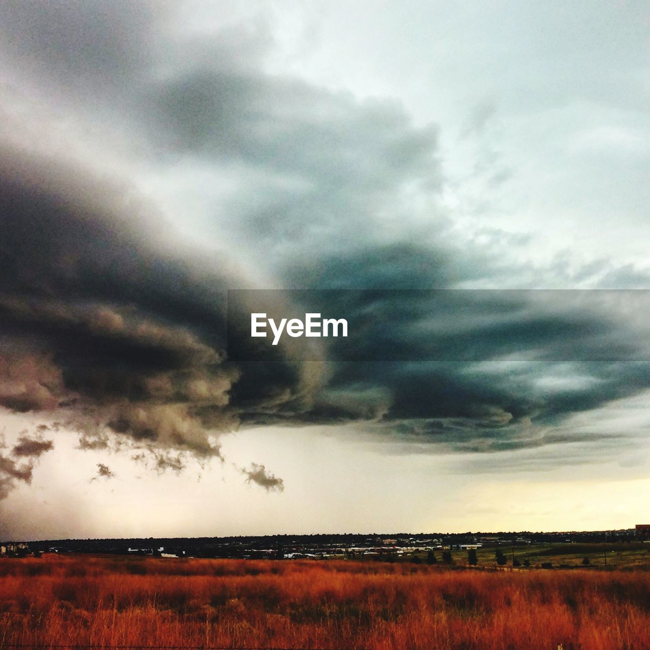 SCENIC VIEW OF LANDSCAPE AGAINST CLOUDY SKY