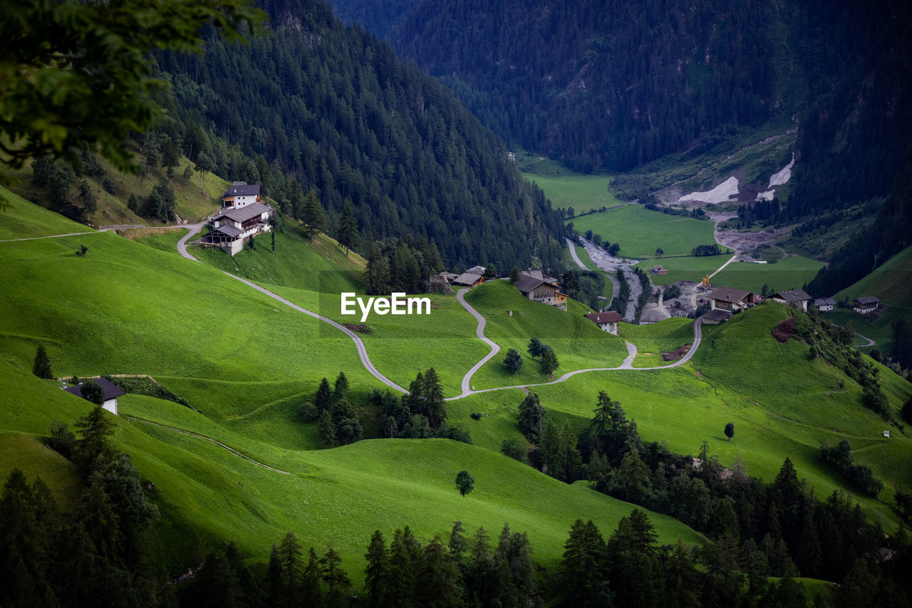 high angle view of trees and mountains against sky