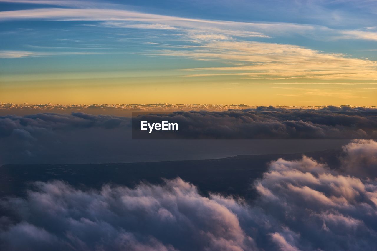 Low angle view of dramatic sky during sunset