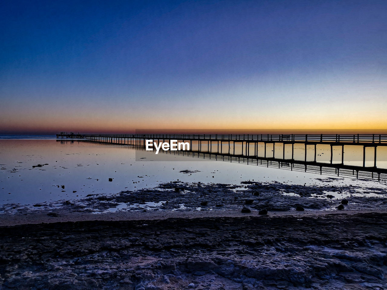 SCENIC VIEW OF BEACH AGAINST CLEAR SKY