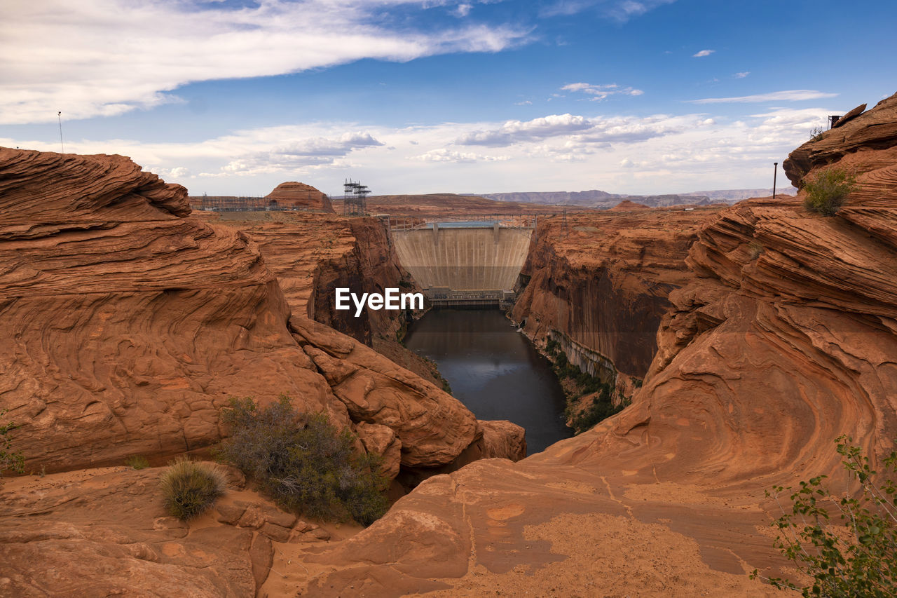 VIEW OF ROCK FORMATIONS AGAINST SKY