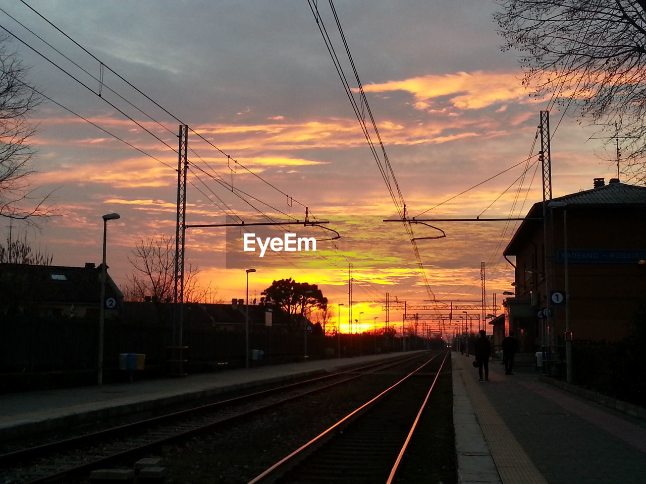 RAILROAD TRACKS DURING SUNSET