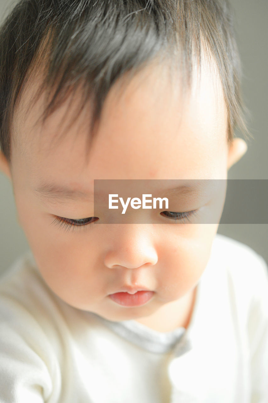 CLOSE-UP PORTRAIT OF CUTE BABY BOY