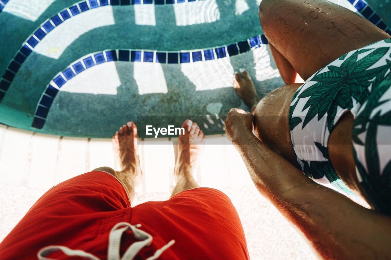 Low section of people in swimming pool