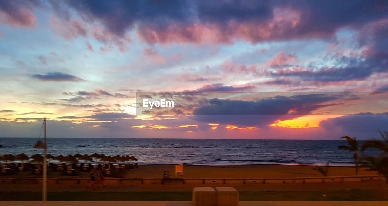 SCENIC VIEW OF SEA DURING SUNSET