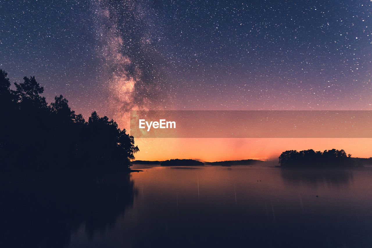 Scenic view of star field against sky at night