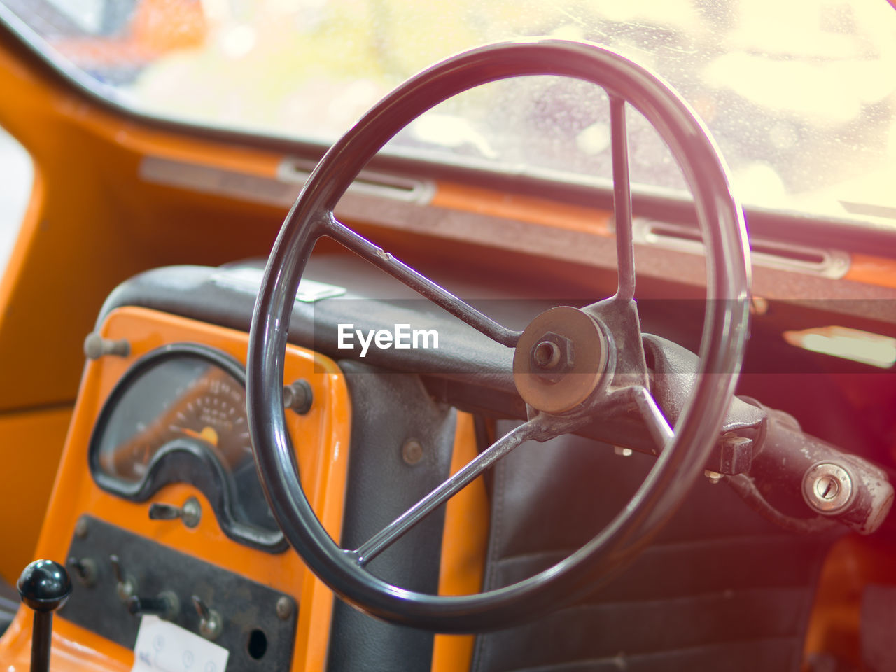 Close-up of vintage car steering wheel