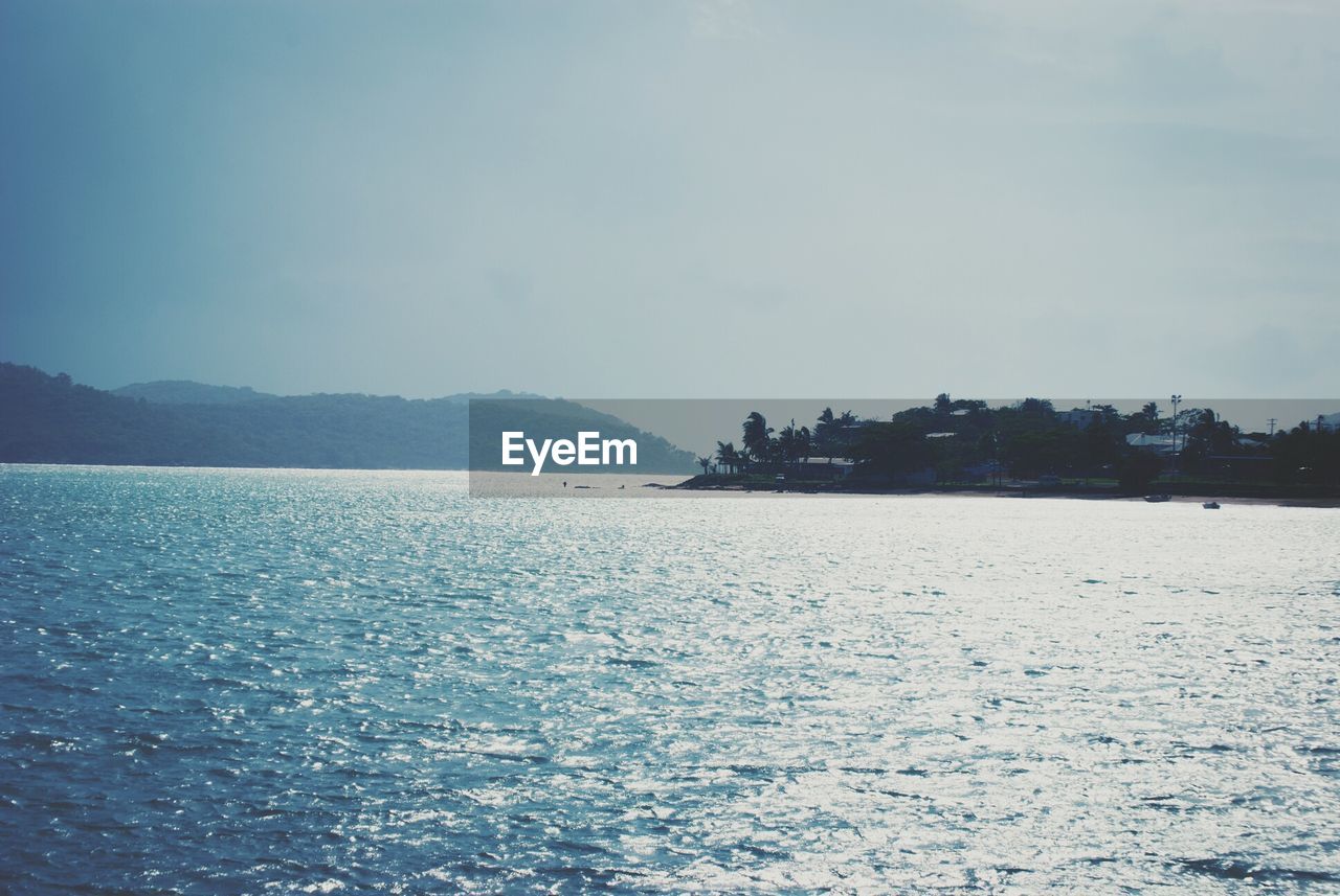 Scenic view of calm sea against clear sky