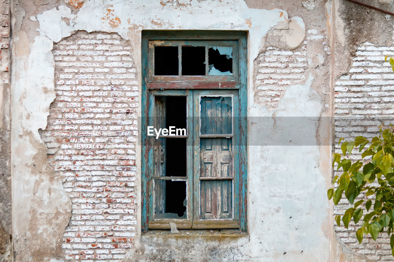 closed wooden door of old house