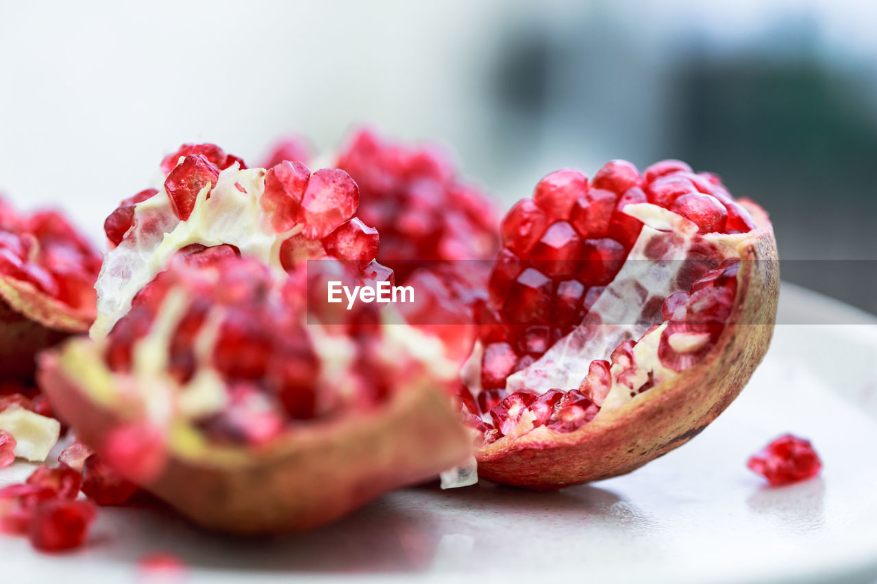 close-up of pomegranate on white background