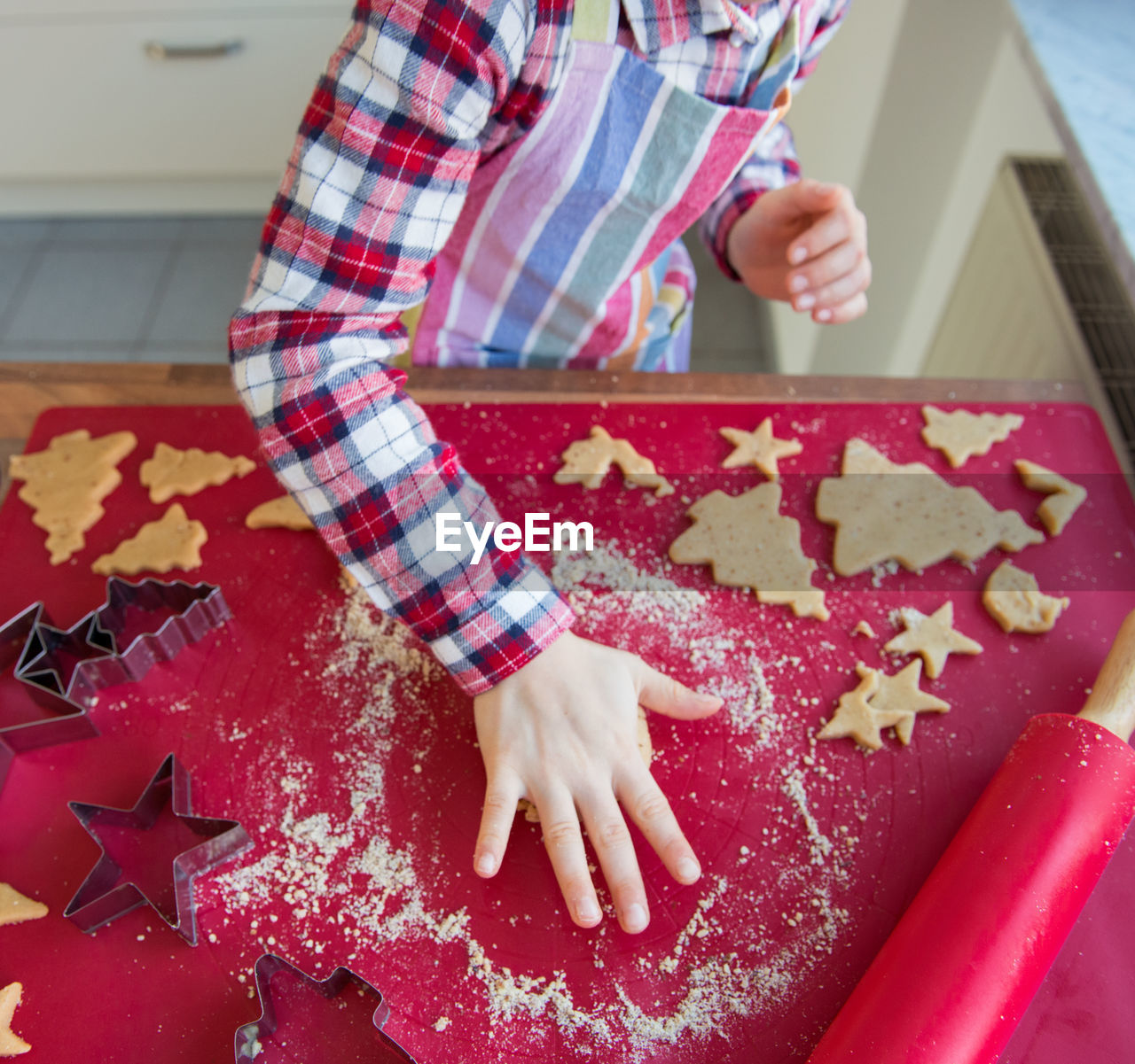 Girl making cookies at home